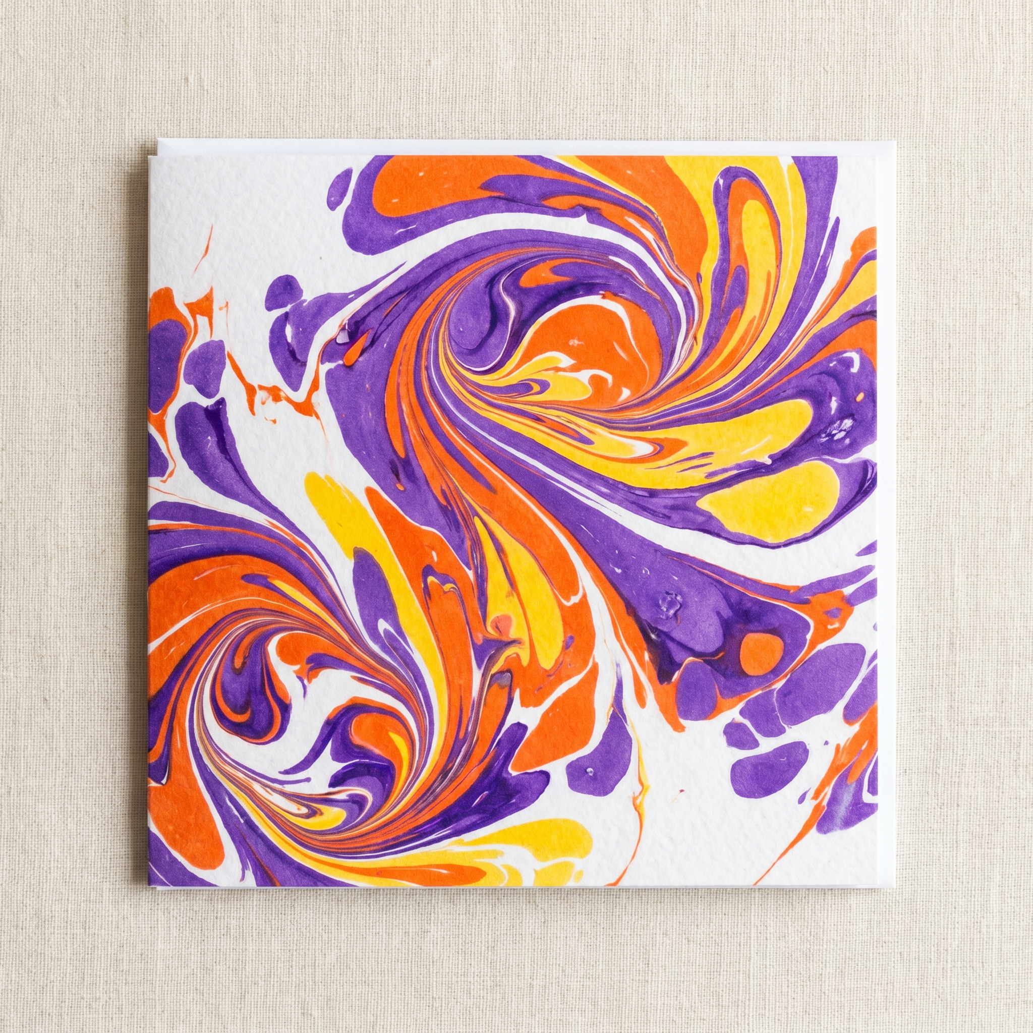 Close-up of a handmade marbled card